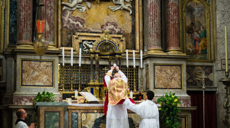 Consecration of the Eucharist during the Latin Mass offered in Rome.