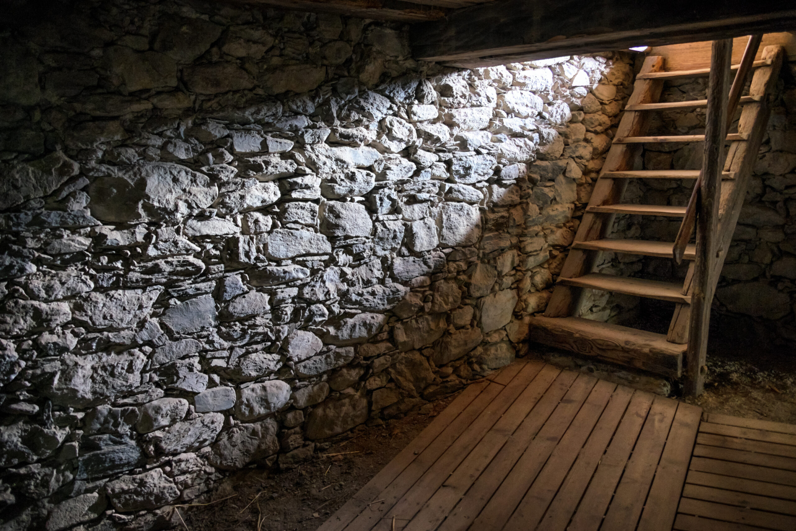 dark cellar with staircase to light